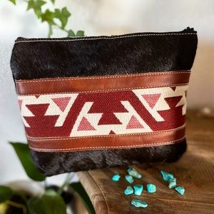 Cowhide makeup bag